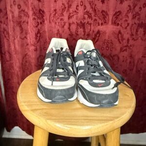 Nike Black and White Athletic Shoes with Red Details